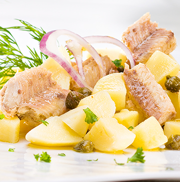 Lauwe aardappelsalade met sardienen